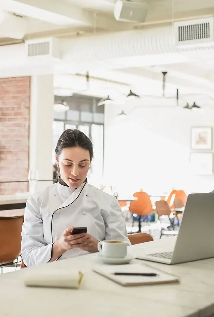 Chef using smartphone